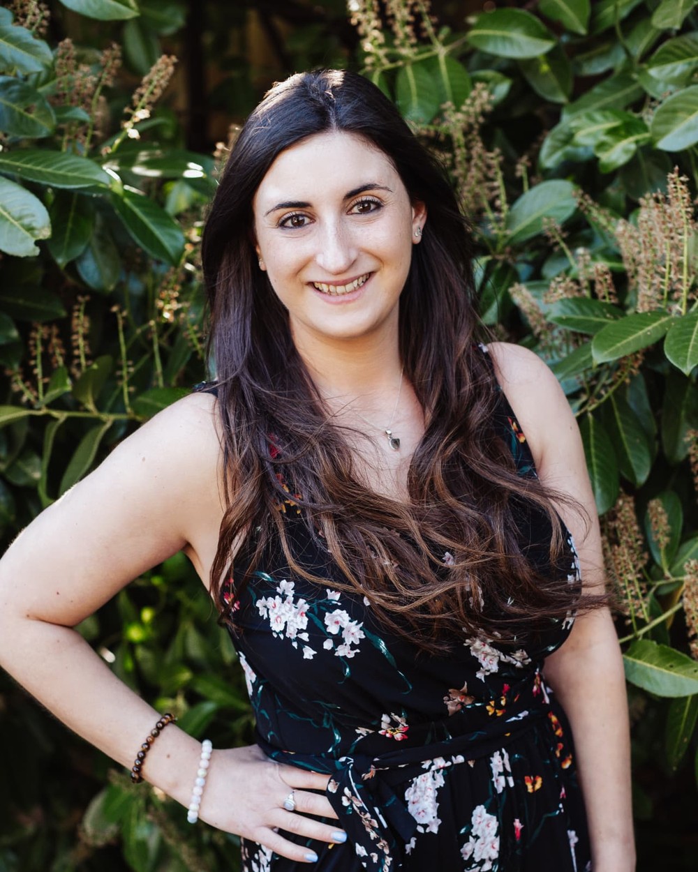 Charlotte Simmons smiling outdoors