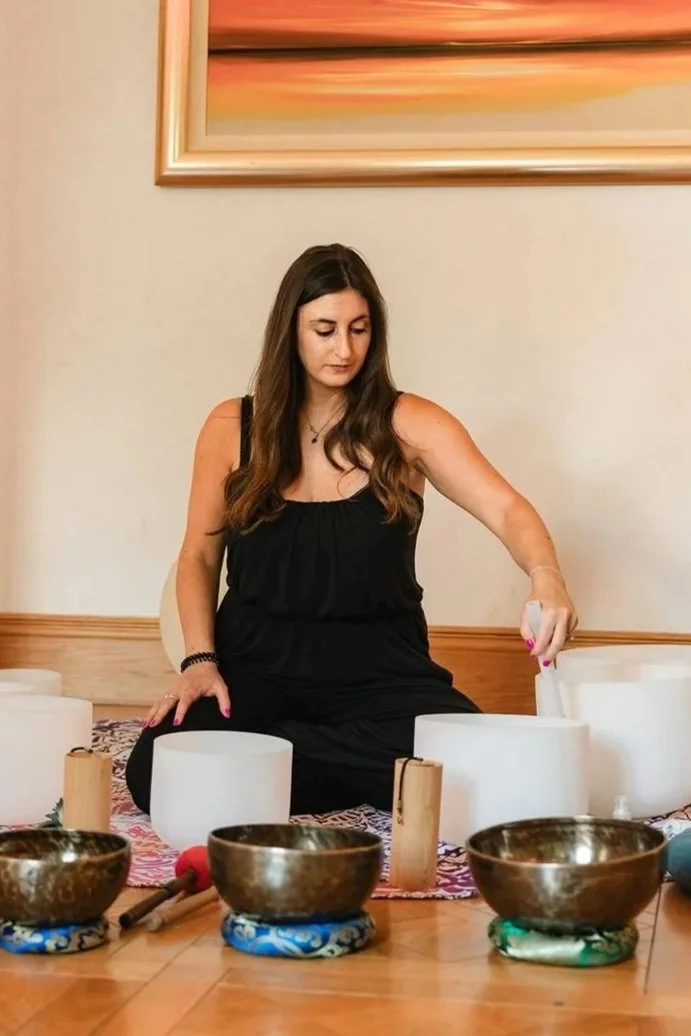 Charlotte playing crystal singing bowls